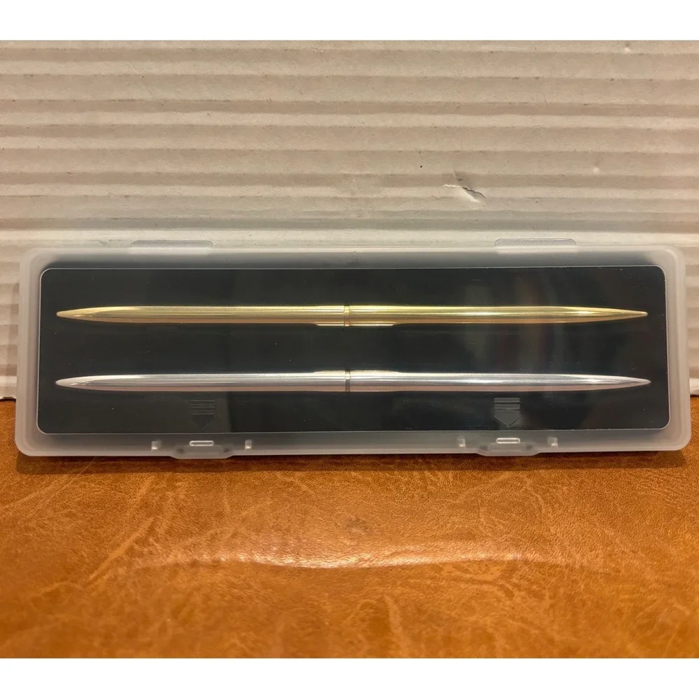 Vintage Slim Minimalist Metal Twist Pens 1 Gold and 1 Silver with storage case.